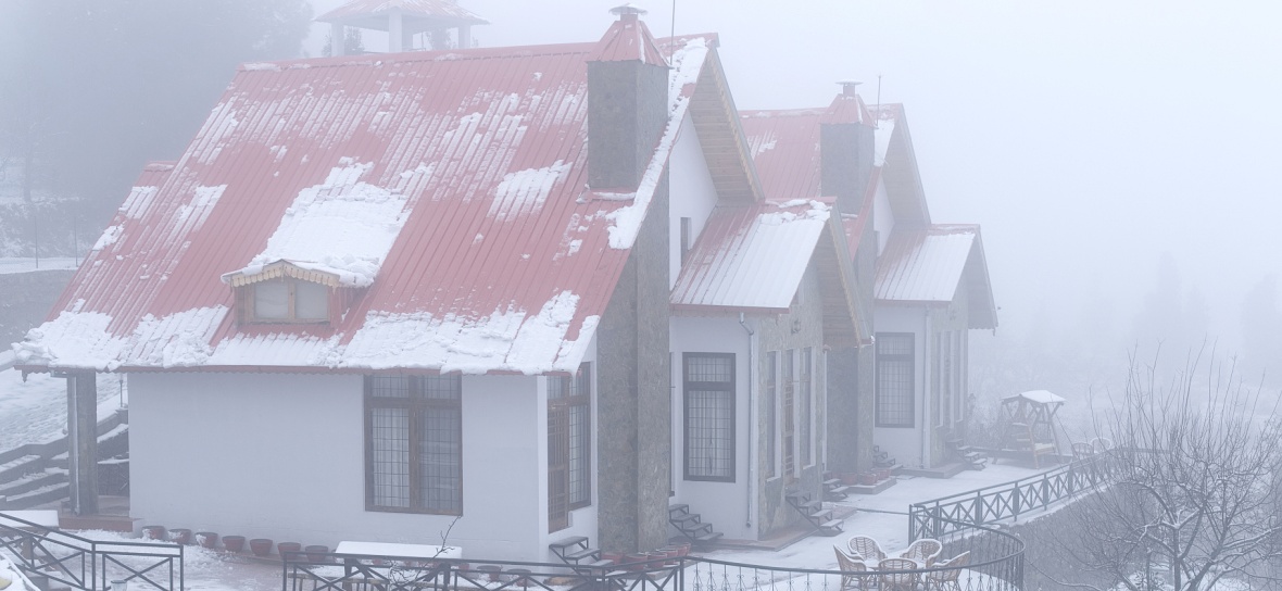 Cottages in Snow and Fog